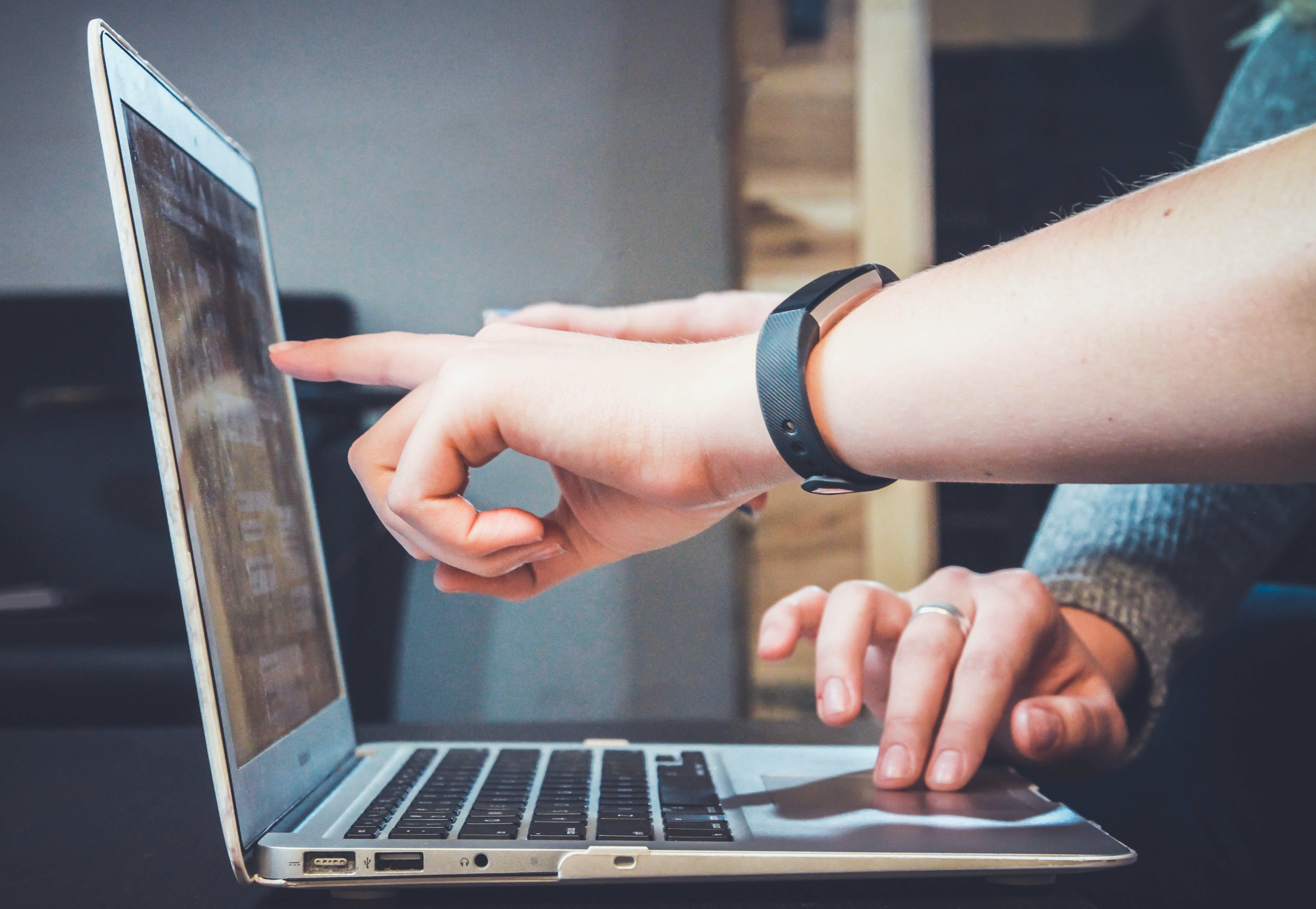 Hands at laptop