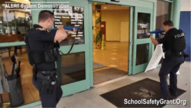 Two police officers partake in ALERT demonstration