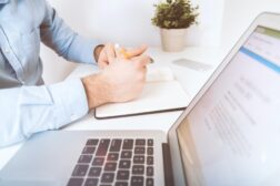 Employee sits at desk