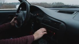 Driver pushes dashboard button