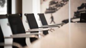 empty conference table and chairs