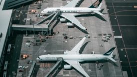 planes at airport being boarded