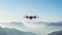 drone flying over mountains