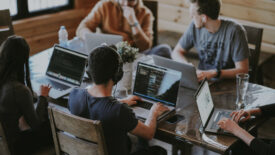 employees-working-around-table.jpg