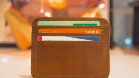 leather wallet full with credit cards