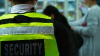 security officer in yellow vest