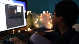 child playing on computer