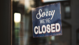 Closed Sign on Business Door