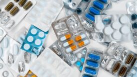 pill packs laying on white table