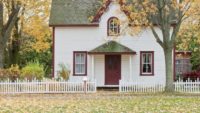 white house with red door and trim