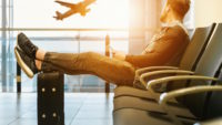 person waiting at airport gate