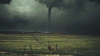 Tornado touching down on farm