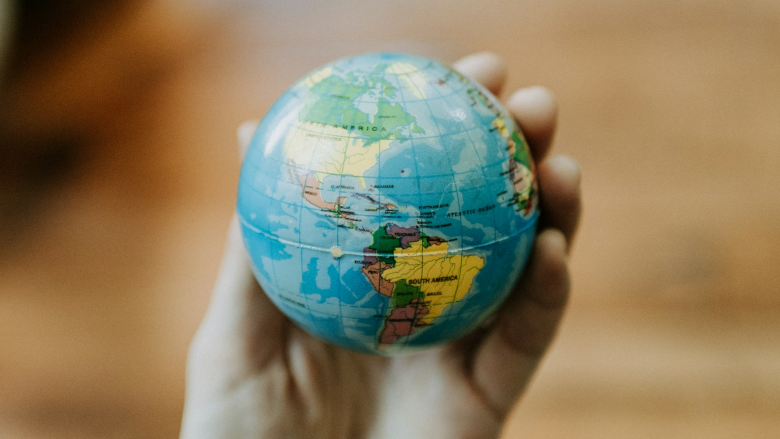 https://www.securitymagazine.com/ext/resources/2024/03/04/Hand-holding-a-globe-of-the-Americas-UNSPLASH.png?1709565562