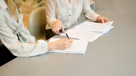 Two women working at a desk