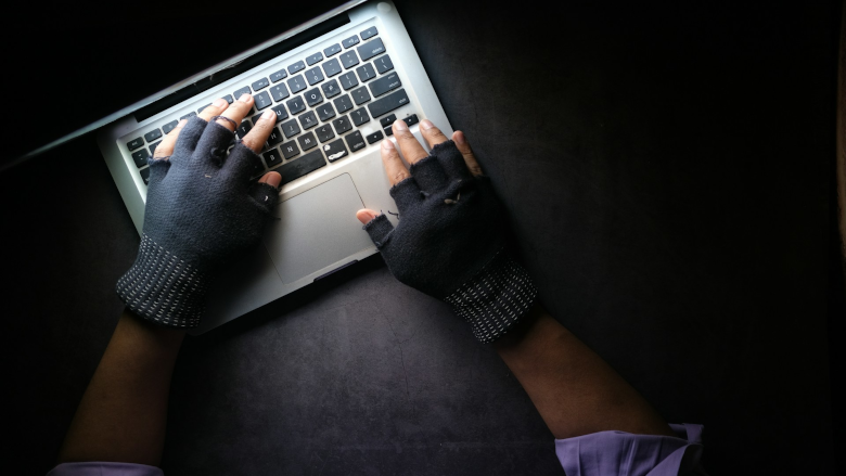 https://www.securitymagazine.com/ext/resources/2024/05/14/Gloved-hands-typing-on-a-lapop-UNSPLASH.png?1715696678