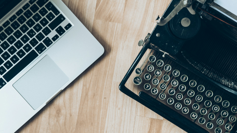 Laptop and typewriter