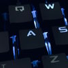 Black keyboard with blue letters