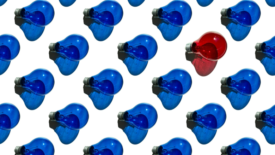 Blue lightbulbs with one red
