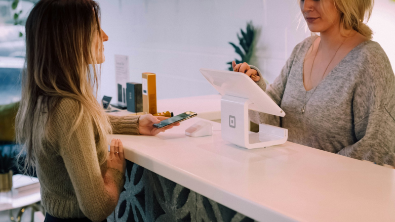 Woman at cash register