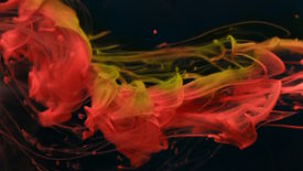 Swirls of orange, yellow, and red on black screen