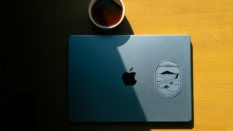 Laptop and coffee in shade