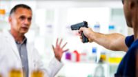 Doctor held at gunpoint