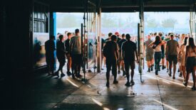 Crowd of people entering a large event